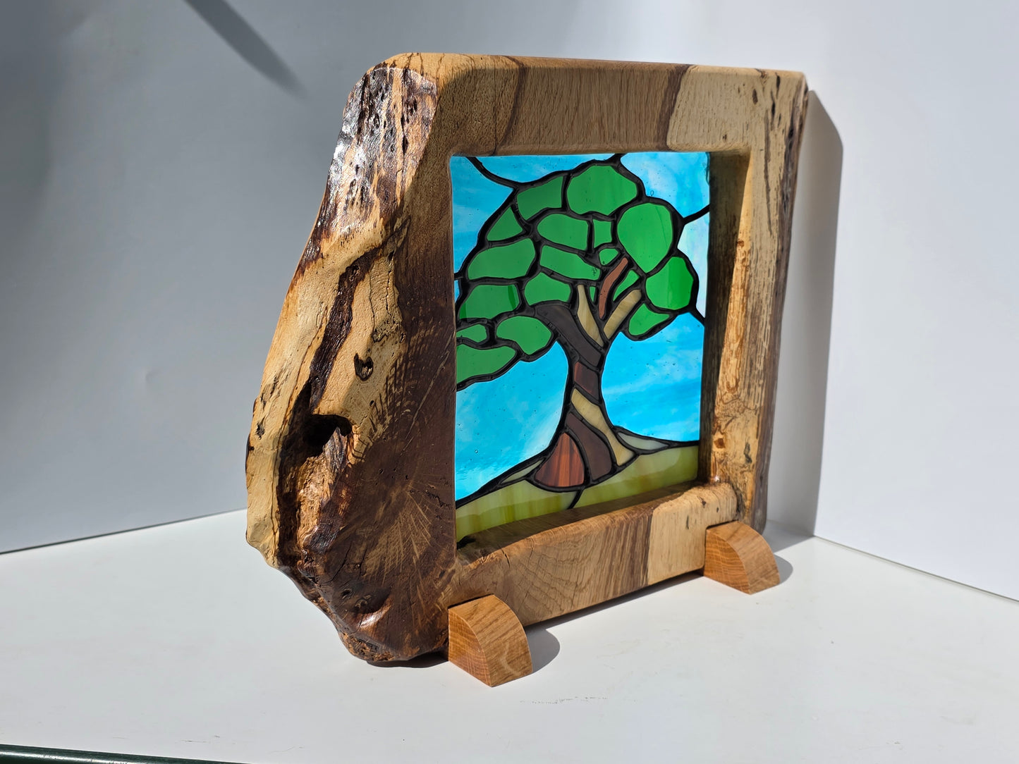 Stained glass 'Old Oak Tree' in a solid oak frame