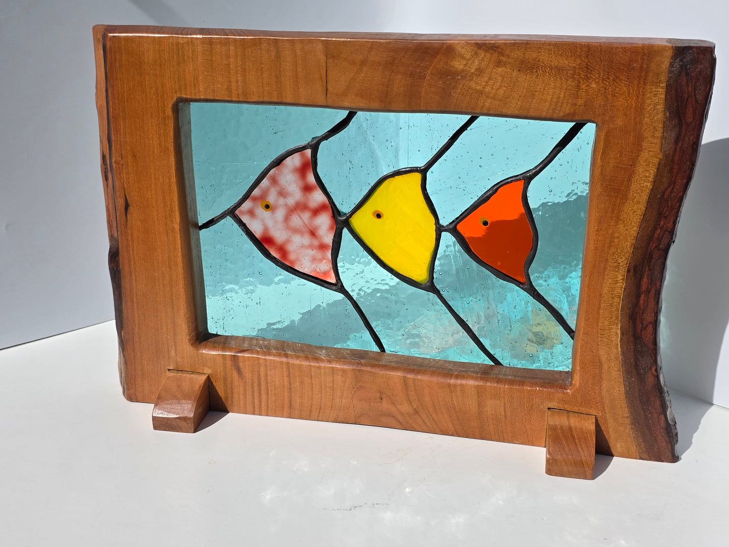 Stained glass 'Trio of Fish' framed in solid wood