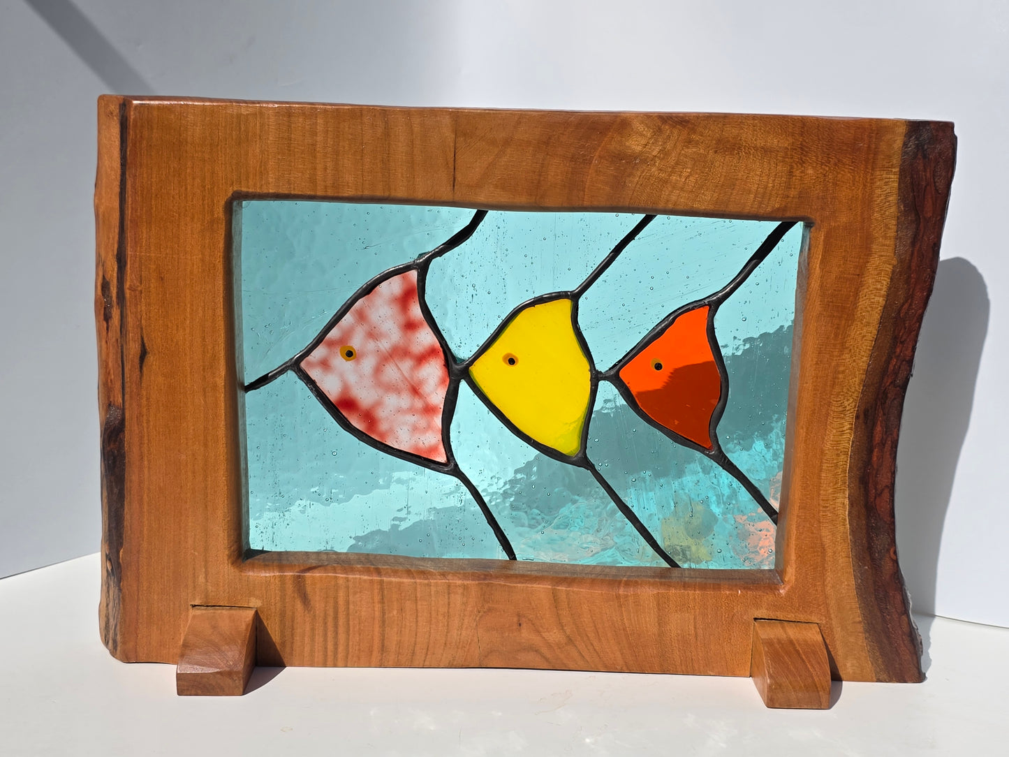 Stained glass 'Trio of Fish' framed in solid wood