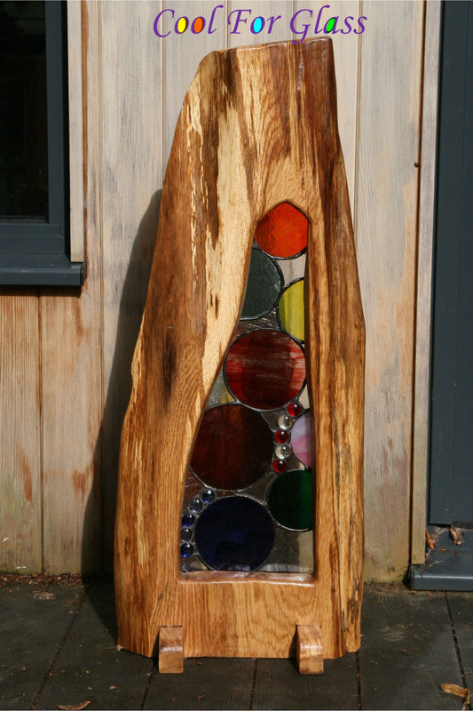 'Circles' stained glass in sustainably sourced brown oak frame.