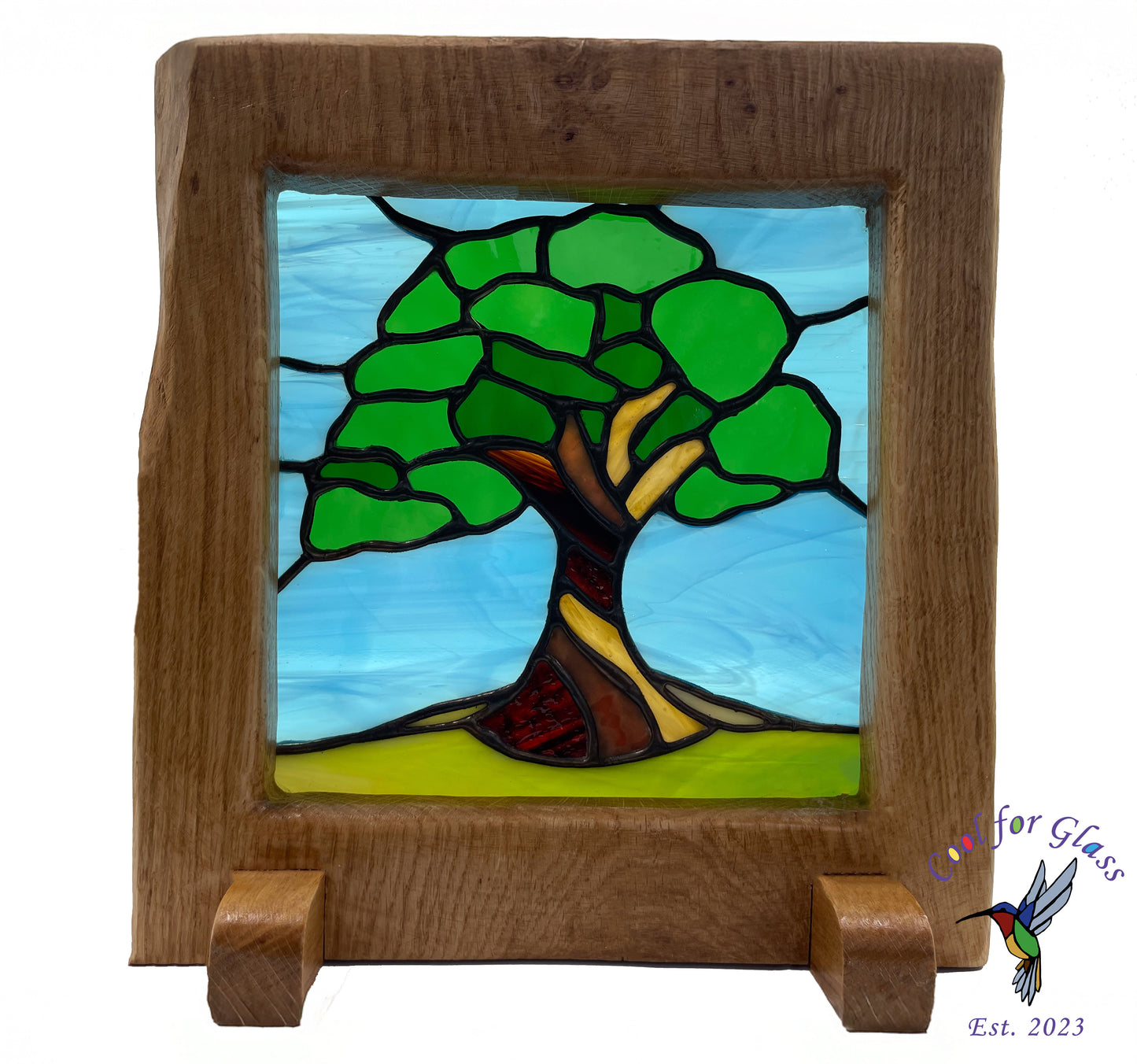 'Old Oak Tree' stained glass panel framed in sustainably sourced oak.